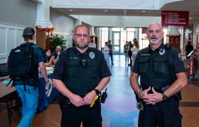 DPS officers posing in a hallway