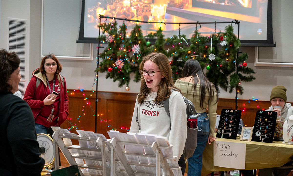 people shopping at an indoor market