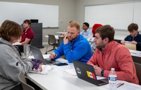 students preparing taxes