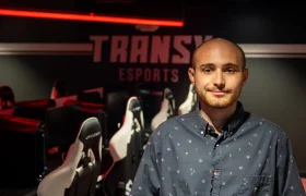 person posing in an esports arena