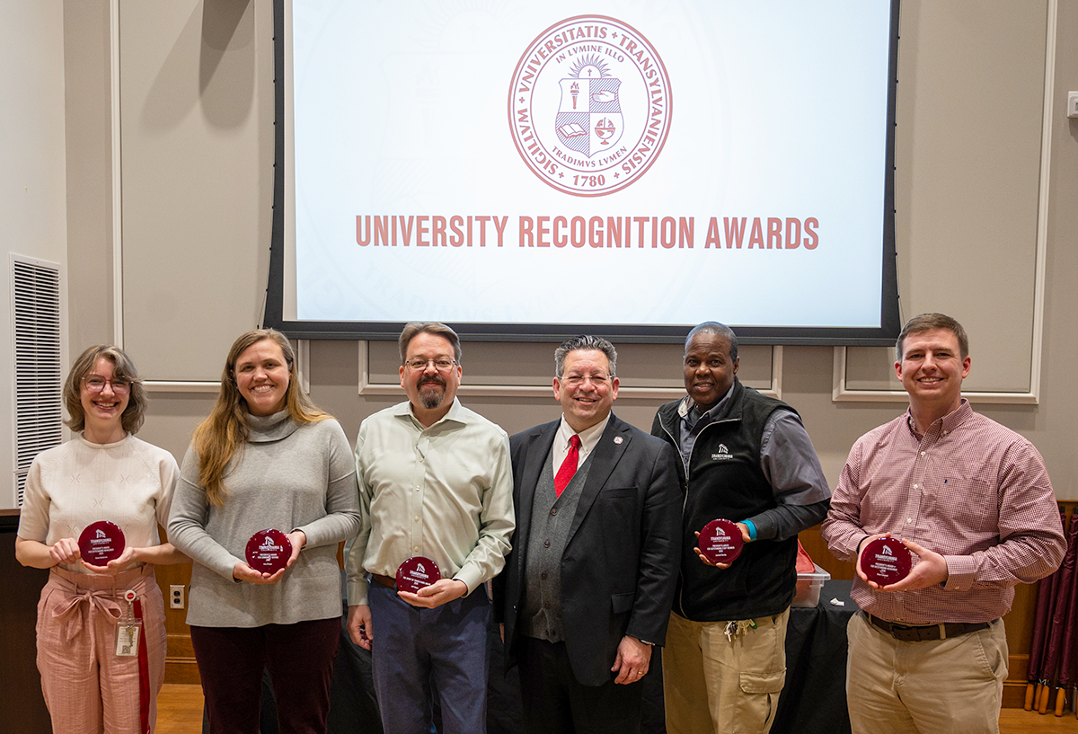 people holding awards