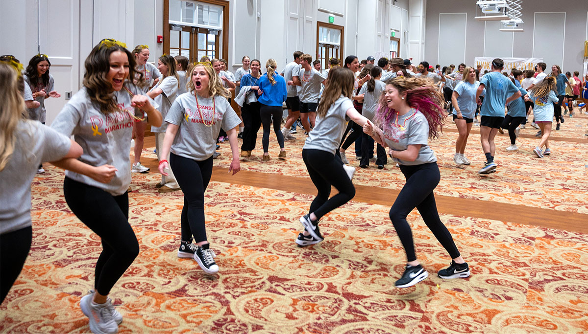 students dancing in a large room