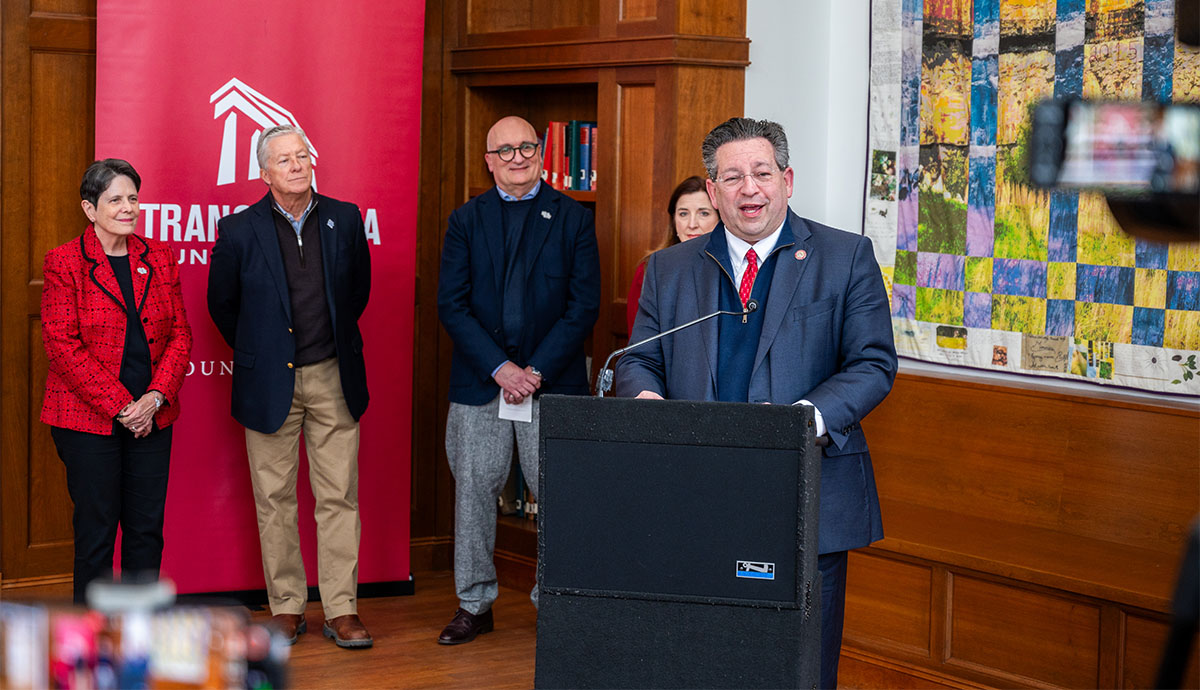 person talking at a podium