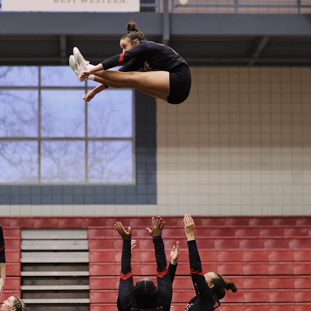 stunt athlete thrown high into the air