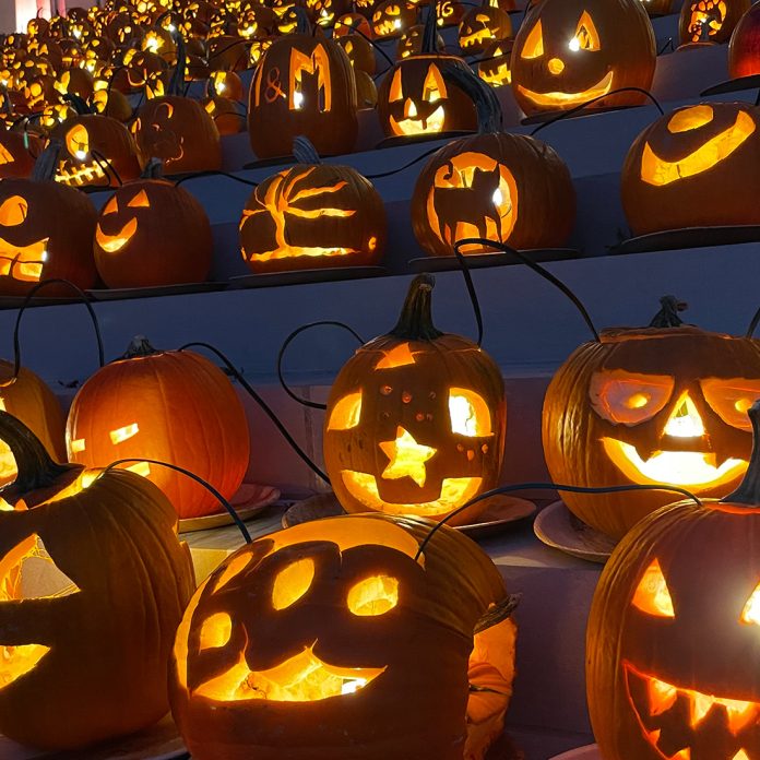 close up of lit pumpkins on old morrison steps