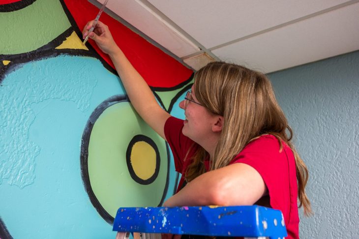 Savannah working on the mural